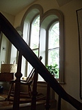 Rounded windows with rocking chair