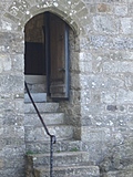 Stone steps leading up to a chapel door