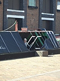 Dad peeking out of a canal barge