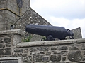 Cannon on stone wall
