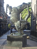 Naked youth on a horse