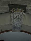 Stone head with gold crown