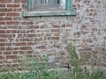 Under the vestibule window