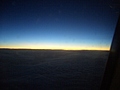 Sunset over the clouds