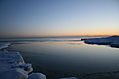 Sunset at the shore in winter