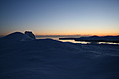 Snowy shore at sunset