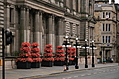 Neoclassical entrance with carefully manicured flowers