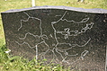 Tombstone with a map