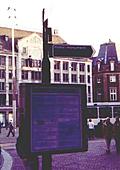 [Picture: street-sign to Homomonument]