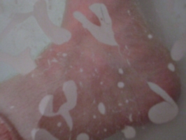 [picture: Bare foot underwater]