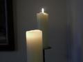 [Picture: Two lit candles]