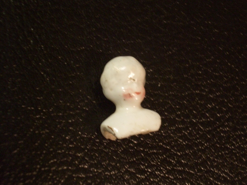 [Picture: Old china doll’s head 4]