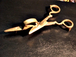 [picture: Candle wick-trimming scissors]
