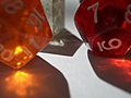 [Picture: coloured plastic gaming dice 5]