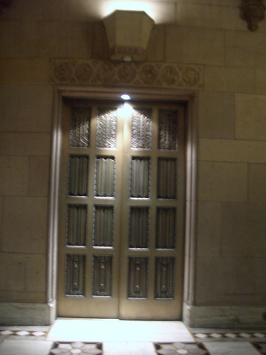 [Picture: Gold elevator door]