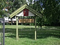[Picture: Blank sign board in a park]