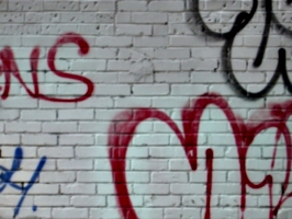[picture: Wall with graffiti]