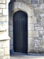 [picture: Oak doorway in stone wall]