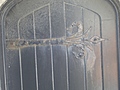 [Picture: Door hinge]