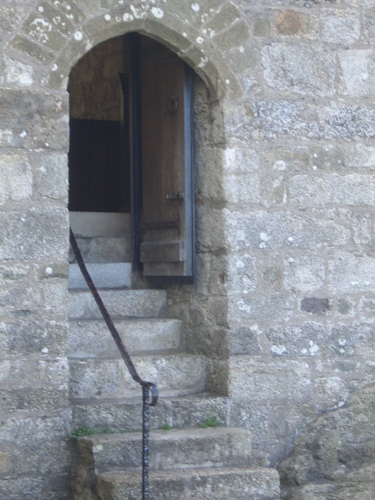 [Picture: Stone steps leading up to a chapel door]