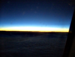 [picture: Sunset over the clouds]