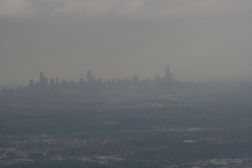 [Picture: Chicago skyline from the air]