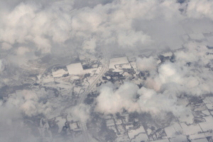 [picture: Snow-covered fields seen through clouds 6]