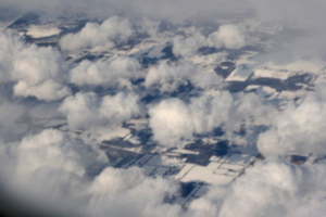 [picture: Snow-covered fields seen through clouds 10]