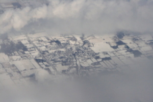 [picture: Snow-covered fields seen through clouds 13]