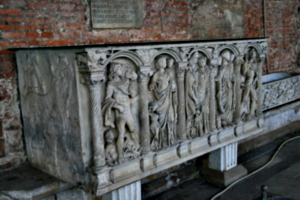 [picture: Richly carved sarcophagus]
