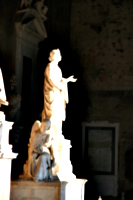 [picture: Declaiming lady with weeping angel]