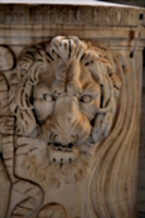 [picture: Carved lion's head]