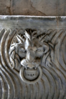 [picture: Stone lion's head with ring 2]