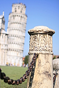 [Picture: Carved stone fence-post]