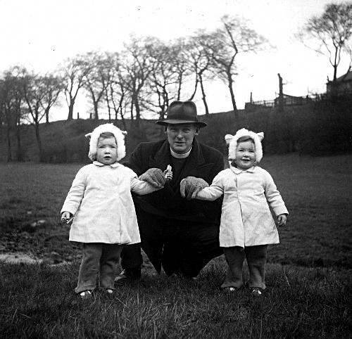 [Picture: 3.—Proud Father With Twins]