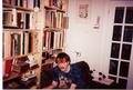 [Picture: Liam using a laptop computer in 1998 or 1999, with a cat (Moon) helping.]