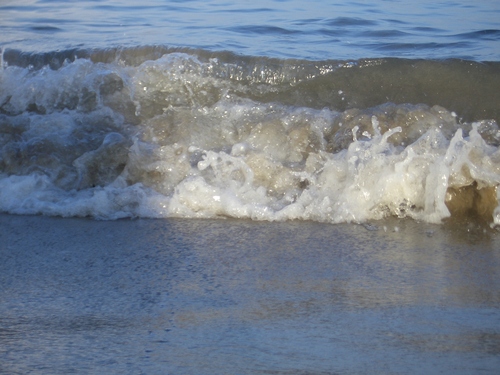 [Picture: wave on the beach]