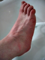 [picture: A wet bare foot]
