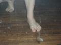 [Picture: Man walking barefoot]