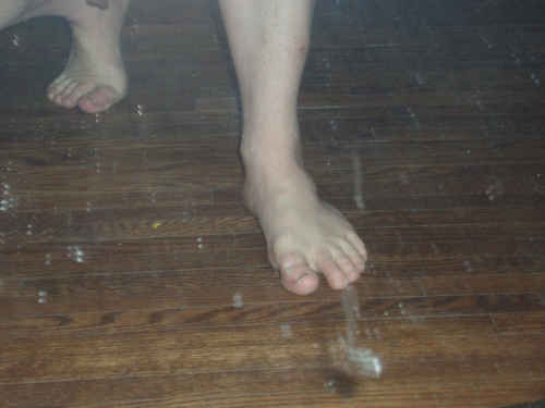 [Picture: Man walking barefoot]
