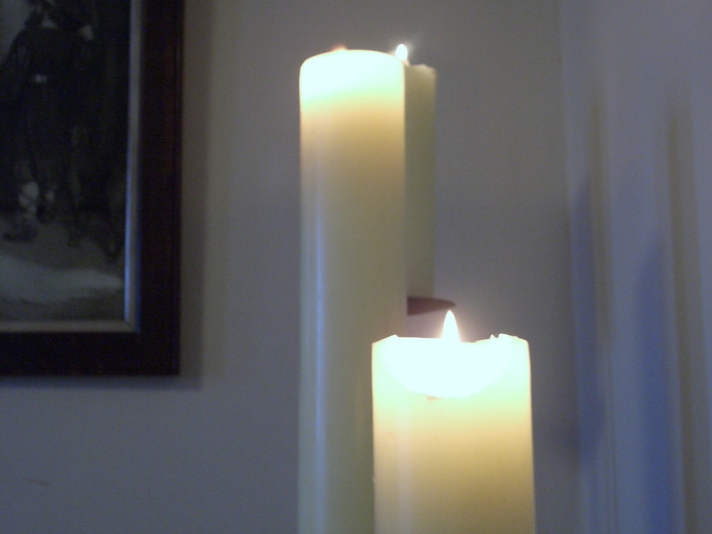 [Picture: Two lit candles]