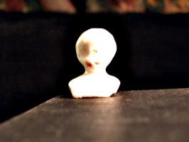 [picture: Old china doll's head 2]