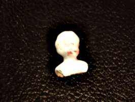 [picture: Old china doll's head 4]