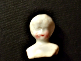 [picture: Old china doll's head 4]
