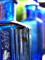 [picture: Blue antique medicine bottle with strong light 3]