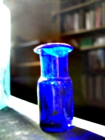 [picture: Tiny blue glass bottle]