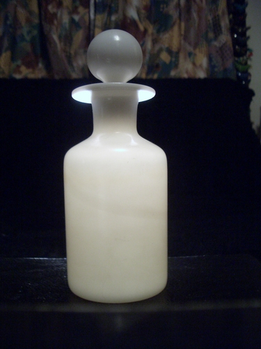 [Picture: Antique white glass bottle 2]