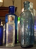 [Picture: More old bottles]