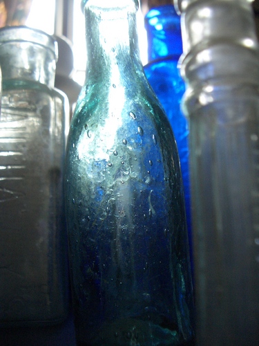 [Picture: Old bottles in daylight]