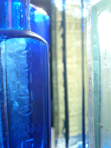 [Picture: Blue antique medicine bottle with strong light 3]